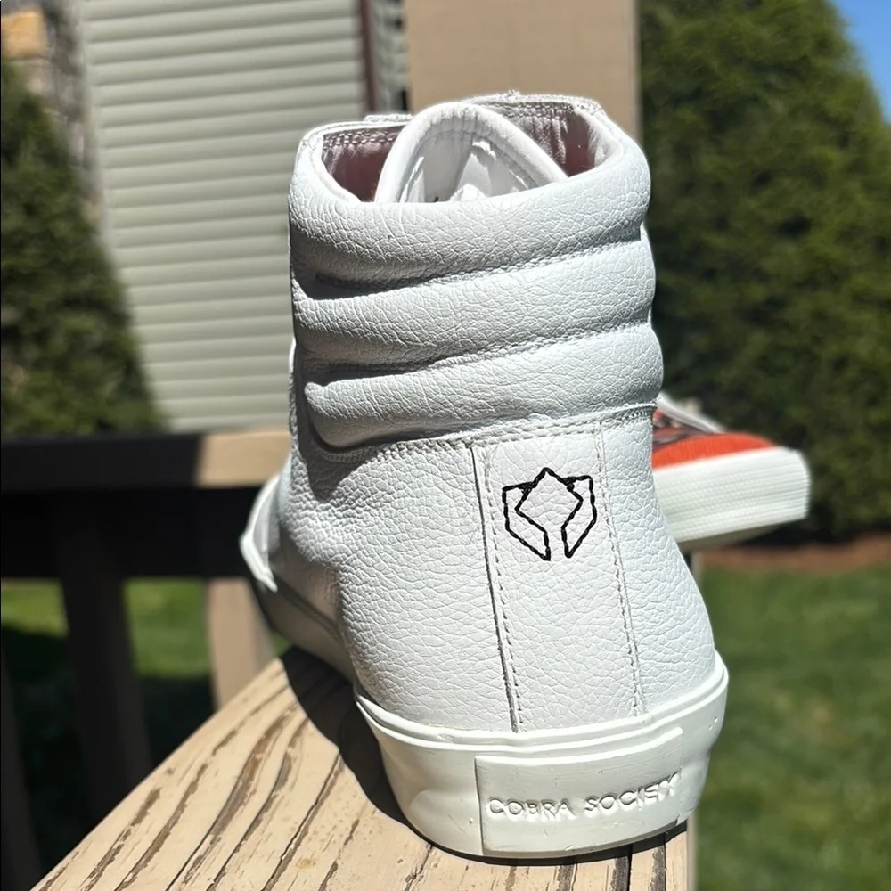 White and Orange High-Top Sneakers with Sporty Design
